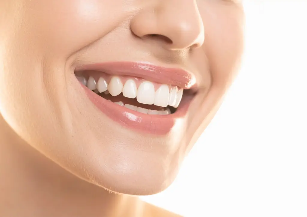 Smiling client after aesthetic treatment at Inga's Secrets Aesthetics Northampton
