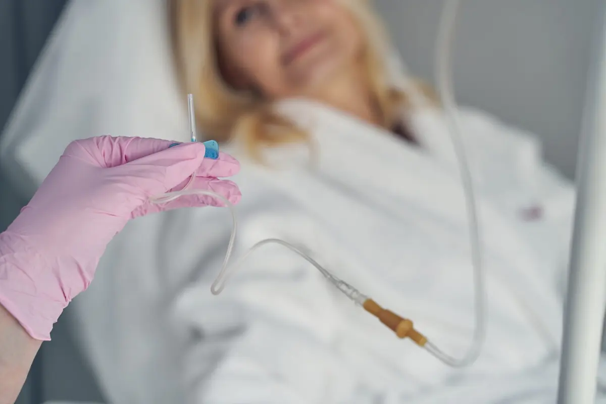 Medical specialist preparing an IV vitamin drip at Inga's Secrets Aesthetics Northampton