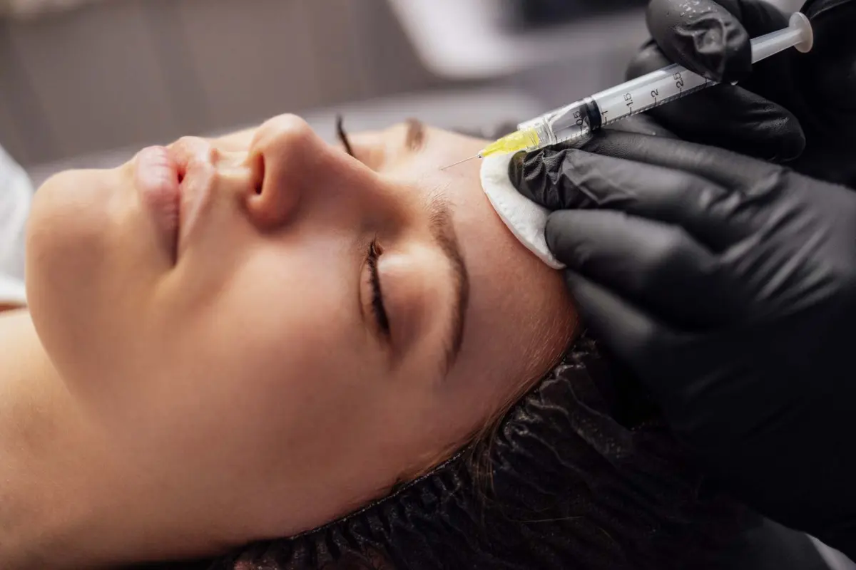 Practitioner in gloves preparing a PRP treatment at Inga's Secrets Aesthetics Northampton